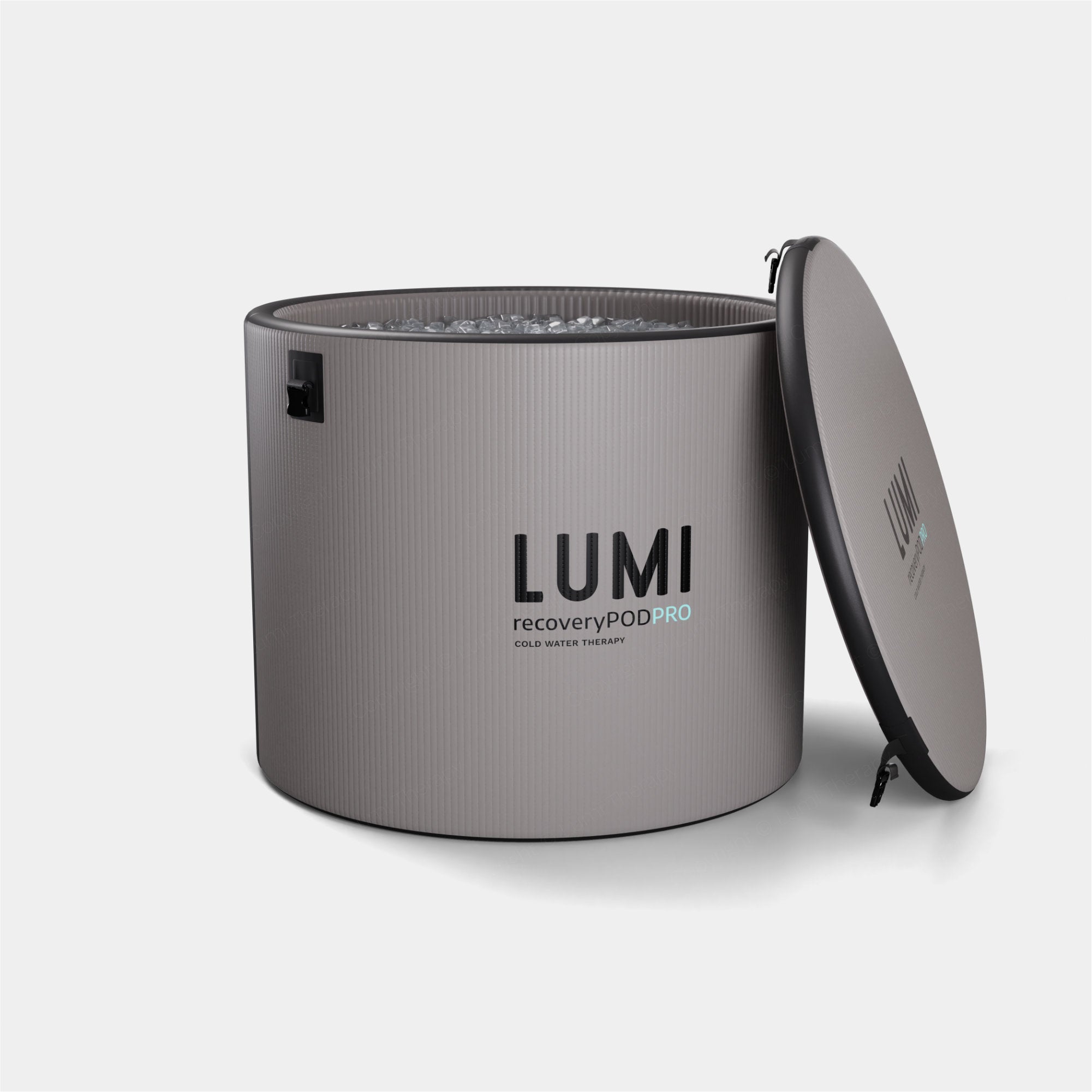 NL - Promo Gifts: LUMI recovery pod pro in sleek gray cylindrical design with removable lid, featuring ribbed texture exterior and black branding, perfect for promotional events and influencer gifting