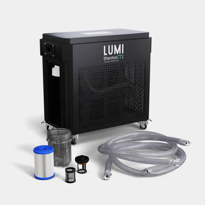 Refurbished LUMI Thermo CT2 Chiller unit shown in matte black with included accessories - water filter cartridge, filter housing, connection hoses, and mounting hardware. Professional-grade cooling system on wheels for ice bath temperature control.