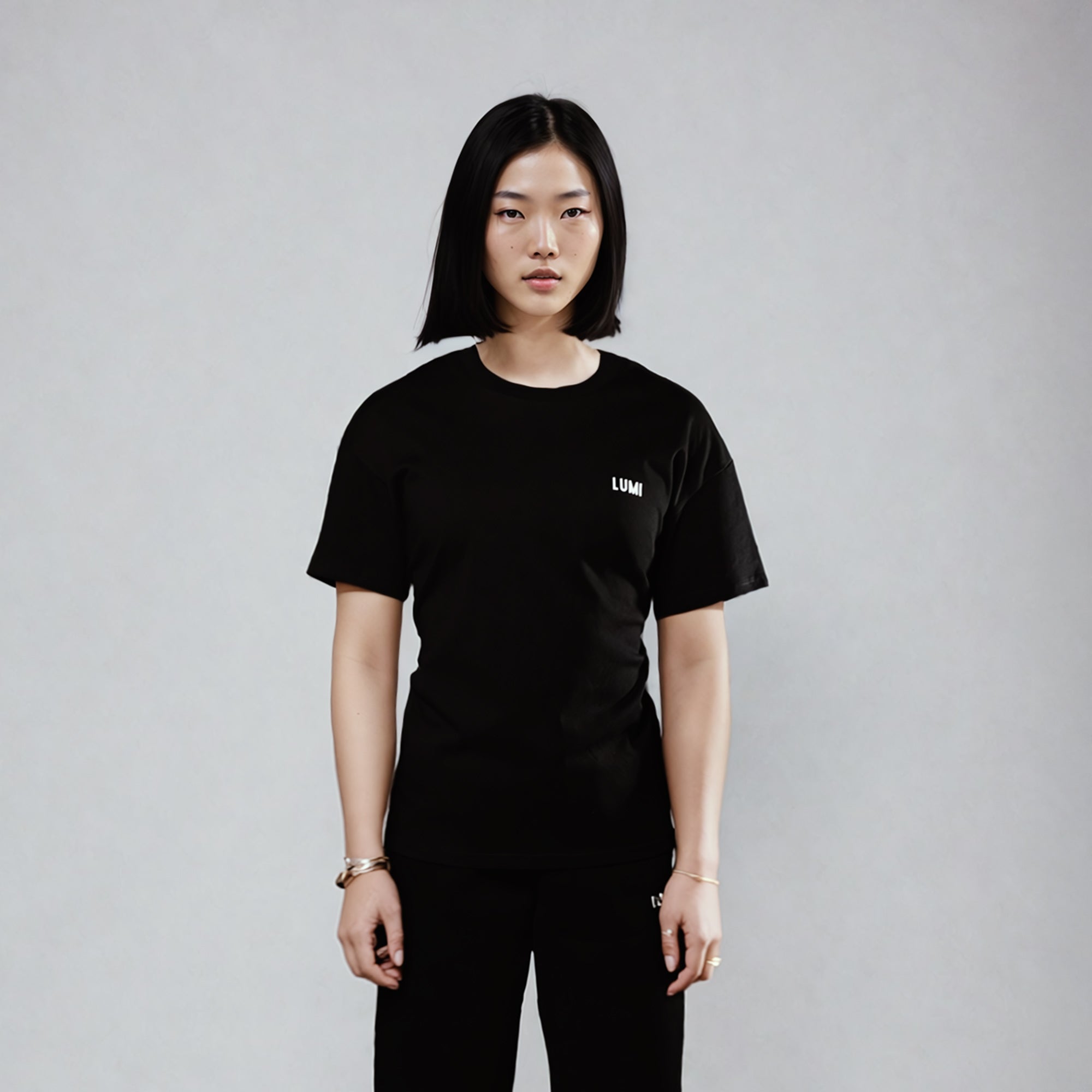 LUMI_Black-Womens-Tee-Model_241114-2.jpg