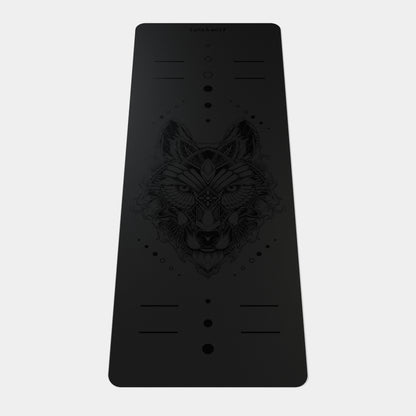 Eco Wolf Yoga Mat featuring an elegant black matte surface with embossed geometric wolf head design, alignment markers, and positioning dots. Premium 4mm thick mat with non-slip texture and eco-friendly material.