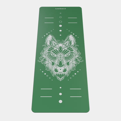 Eco Wolf Yoga Mat in Matcha green featuring a detailed geometric wolf head design in white, with alignment markers and Luna & Wolf branding. The mat displays a symmetrical pattern with positioning dots and lines for proper yoga pose alignment.