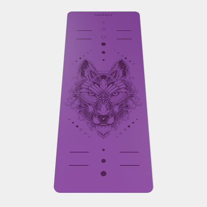 Eco Wolf Yoga Mat featuring an intricate geometric wolf head design centered on a vibrant purple non-slip surface. Premium 4mm thick mat with alignment markers and Luna & Wolf branding at the top. The mat displays a detailed mandala-style wolf illustration with decorative dots and lines.