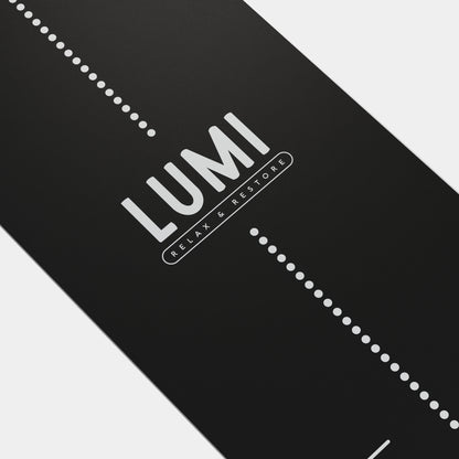 Eco Wolf Yoga Mat - Stretch featuring a sleek black design with LUMI branding in white, accented by stylish dotted lines. Premium 4mm thick eco-friendly exercise mat with non-slip surface for enhanced grip and comfort during yoga practice.