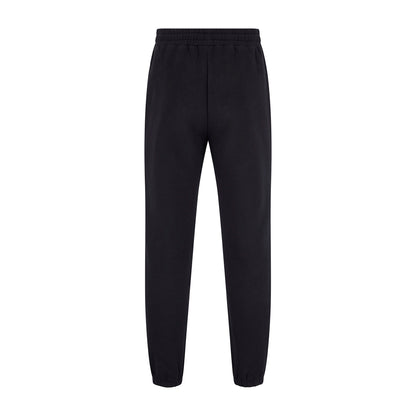 Women's LCC Sweatpants Black featuring elastic waistband and cuffed ankles, made from heavyweight cotton-polyester blend fabric in classic black. Relaxed-fit joggers with raised rubber LUMI logo detail, perfect for athletic and casual wear.