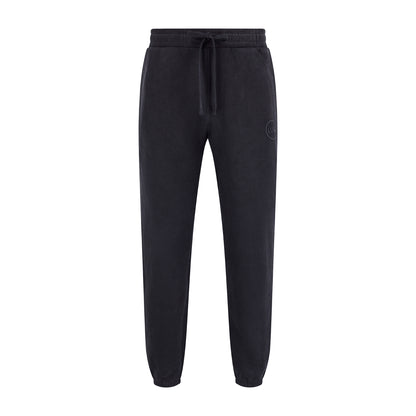 Women's LUX Sweatpants Black Wash featuring a relaxed-fit silhouette in premium black cotton-polyester blend, with elastic waistband, drawstring closure, cuffed ankles, and raised rubber logo detail, perfect for athletic and casual wear.