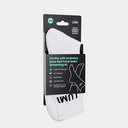 LUMI Pro Bamboo Socks displayed in retail packaging featuring white sports sock with black branding, eco-friendly product details, and minimalist line art illustration. Package highlights anti-bacterial, breathable properties and sustainable bamboo material with elasticated support features.