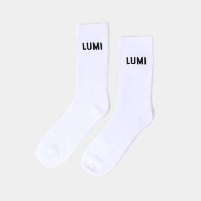 Pro Bamboo Socks (4 Pack) - White athletic socks with black LUMI logo displayed on cuff, featuring elasticated support and bamboo fiber construction for comfort and breathability. Photographed as a pair against light background.