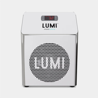 LUMI miniULTRA Chiller unit with sleek mirror-finish metal housing, featuring digital temperature display and circular perforated front panel with LUMI branding. Compact ice bath cooling system with professional-grade design for home recovery therapy.