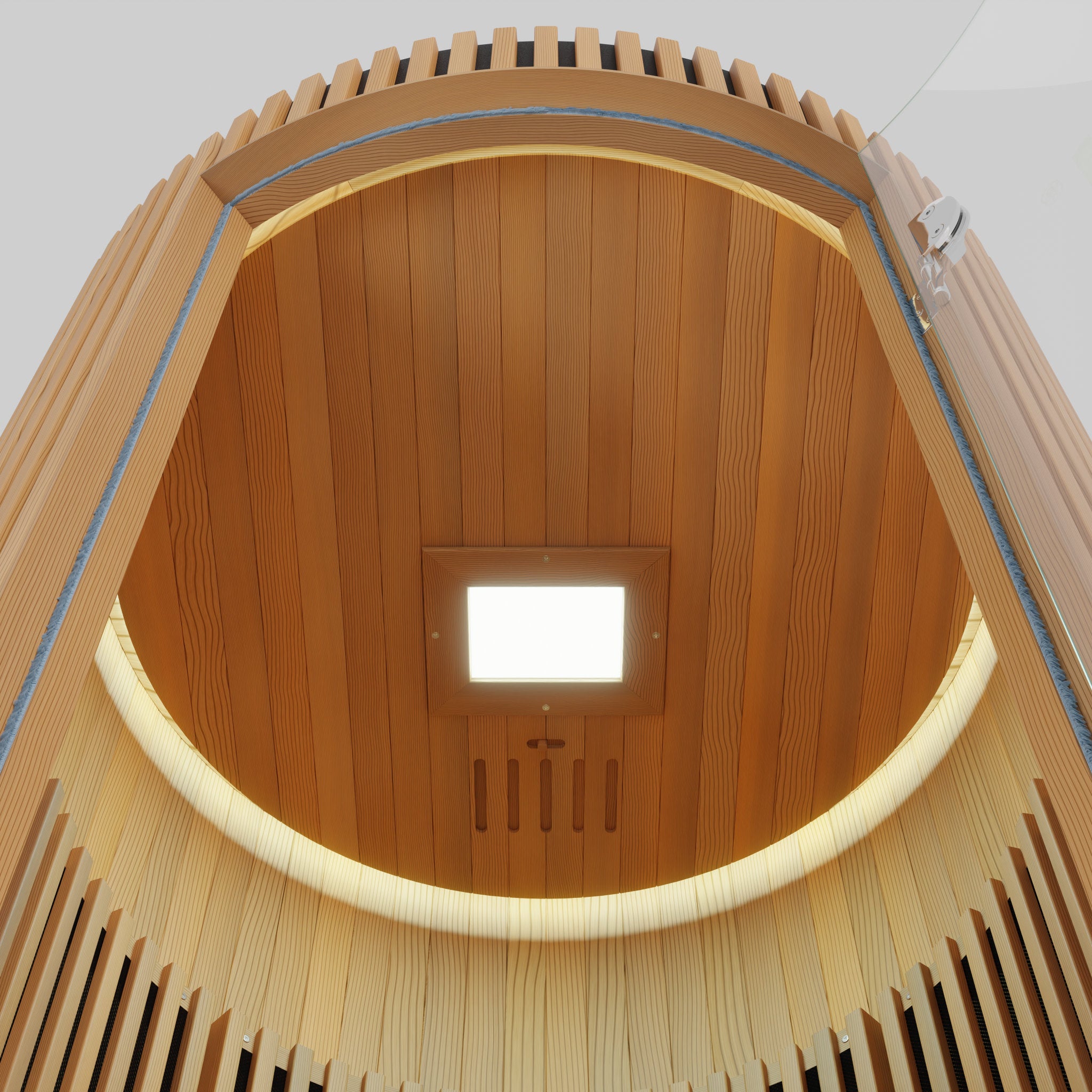 LUMI Sauna PRO interior ceiling view showing elegant curved Hemlock wood paneling, built-in LED light panel, and premium barrel-style construction with modern Nordic design elements emphasizing warmth and craftsmanship